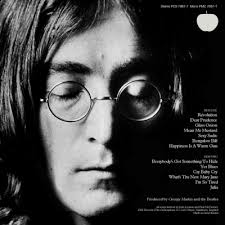 If John Lennon's white album songs were his first solo album, where would  it rank ?