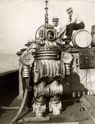 A diving suit may also incorporate a breathing gas supply (i.e. Into The Abyss 20 Fascinating Vintage Deep Sea Diving Photos
