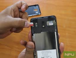 Push the tray opener pin in the tray hole and slide the tray out. Nokia 2 Hands On How To Insert Sim Microsd Cards Nokiapoweruser