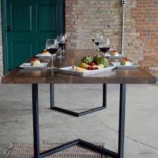 Solid wood can swell or shrink due to changes in temperature and humidity as it is a hygroscopic material, which means it naturally. Modern Walnut Dining Table With Black Steel Frame Dining Table Legs Industrial Style Table Walnut Table