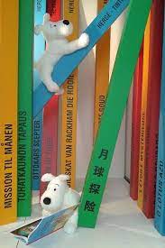 The Boutique Tintin Brussels Store S New Autumn 2013 Window Snowy Is The Star Together With The Albums Tintin Las Aventuras De Tintin Historietas