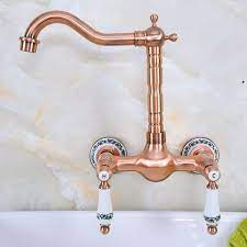 Choose from our from wide selection of kitchen taps and sprayers, designed to match any sink style and fit any space. Antique Red Copper Brass Wall Mounted Bathroom Kitchen Sink Faucet Swivel Spout Mixer Tap Dual Ceramics Handles Levers Anf954 Kitchen Faucets Aliexpress