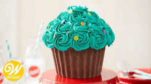 Here are some clever ideas: How To Make A Giant Cupcake Cake Youtube