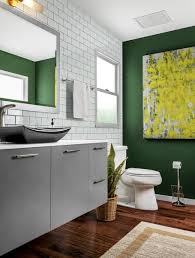 Add A Dash Of Luck To Your Renovation With A Shamrock Green Accent Wall This Bathroom Stays Stately Wi Green Bathroom Colors Green Bathroom Green Accent Walls