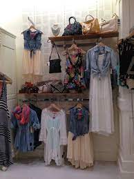 Look Closely Consignment And Resale Shopkeepers A Few Face Out Fixtures And Shelves And You Have A Wall Moun Clothing Displays Clothing Store Boutique Decor