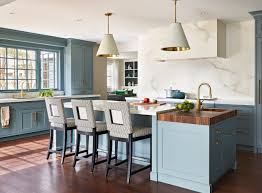 Use a putty knife to scrape any rubber bumpers from the back side of the doors. This Old House Cape Ann Kitchen Boston By Sv Design Houzz