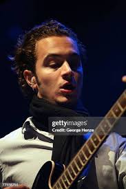 Tom Smith of Editors performing live at the 013