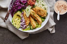 Calories per serving of baja fish tacos 130 calories of whole wheat tortilla, medium (45g), (1 serving) 126 calories of tilapia (3.5 oz or 99.2g), (3.50 oz) 72 calories of avocados, california (haas), (0.25 fruit without skin and seeds) Grain Free Baja Fish Taco Bowl Paleo Friendly Tasty Yummies