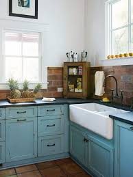 turquoise cabinets w/ dark countertops