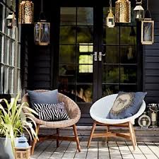 Two Bucket Chairs With Cushions On Outdoor Decking World Market Dining Chairs Conservatory Dining Room Conservatory Furniture