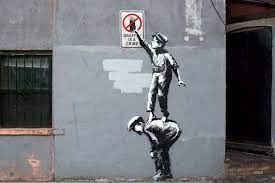 He keeps his identity a secret. Famous Street Artist Banksy Hits Nyc