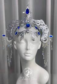 Royal blue gems shimmer in a silver filigree setting ❄