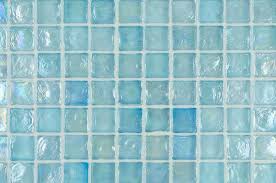 Iridescent Glass Mosaic Tile In A Seafom And Aqua Blue Color Installed With Translucent Grout By Mineral Tiles Glass Mosaic Tiles Glass Tile Mosaic Glass