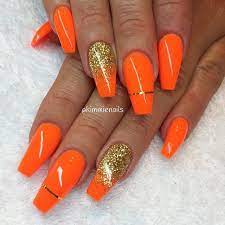 The vibrant, fluorescent hue adds zing to any manicure. Nice Fall Inspired Look Order Custom Polish To Complete This Look From Www Thedippingdivas Com Shopping In 2020 Orange Nails Orange Nail Designs Nail Designs