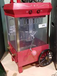 Black kettle popcorn maker with lighted interior. Large Old Fashioned Movie Time Popcorn Maker