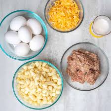 Place hash browns in the baking dish; Hashbrown Breakfast Casserole A Mind Full Mom