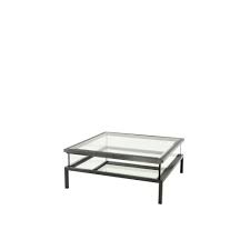 Set atop a unique, geometric base, this glass coffee table crafts a sleek, fashionable look while providing functional storage. Eicholtz 110373 Coffee Table Harvey Bronze Finish Clear Glass Mirror Glass Ideas4lighting