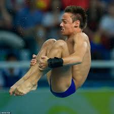 Thomas robert daley (born 21 may 1994) is a british diver, television personality and youtube vlogger. Tokyo Olympics Tom Daley Finally Wins Olympic Gold In Men S Synchronised 10m Platform