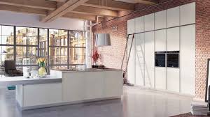 Large crème colored tiles cover the entire space whereas the kitchen cabinets are a soft chestnut shade. Open Kitchen Design Pics Home Architec Ideas