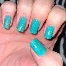 Aqua green with butterfly design. Updated 50 Eye Catching Aqua Nails August 2020
