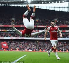 It's not about being a fan of arsenal or chelsea or liverpool, i think klopp should allow aubameyang to score so that he can give us the black panther celebration then arsenal should concede to. Arsenal Striker Aubameyang Recreates Trademark Celebration With Flip Into Swimming Pool Daily Mail Online