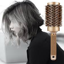 The bristles are surrounded by 65 ceramic plates for more consistent coverage, and it has a digital display with seven different heat settings. Round Brush For Blow Drying With 3pcs Hair Clips Natural Boar Bristle Nano Thermal Ceramic