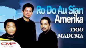 Trio Maduma Rodo Au Sian Amerika Official Lyric Video Youtube Musik Lagu Amerika