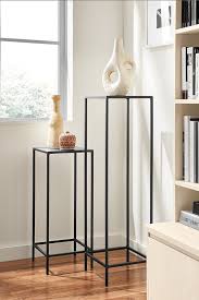 Slim Pedestal Tables In Natural Steel Modern Console Tables Modern Living Room Furniture Room Board Pedestal Table Modern Furniture Living Room Entryway Furniture