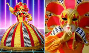 The show features costumed celebrities competing against each other. Who Is Harlequin The Masked Singer Uk Celebrity Clues And Theories Revealed Capital