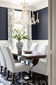 White And Blue Dining Room Boasts A Blue Floral Rug Placed Beneath White And Blue Striped Dining Chair Dark Dining Room Blue Dining Room Walls Dining Room Blue