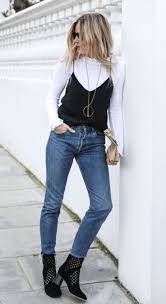 Cool Fall Outfit Idea White High Neck Top Black Silk Tank Top Boyfriend Jeans Boots Fashion Hipster Outfits Fall Casual Fall Outfits