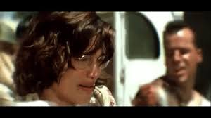 John Mclane from Die Hard makes an apearence in Michael Bays Pearl Harbor.  Which is fitting cause his last project starred Bruce Willis. Just to throw  in John CGI in the movie :