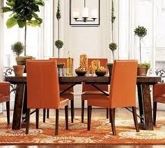 Love The Distressed Wood Table And Orange Chairs Orange Dining Room Thanksgiving Dining Room Decor Orange Dining Room Chairs