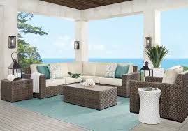 Rialto Brown 3 Pc Outdoor Sectional With Putty Cushions Rooms To Go Outdoor Patio Furniture Sets Outdoor Lounge Set Patio Furniture Sets