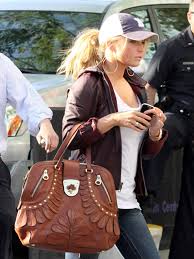 Get complete outfits, trendy tops and flattering pants and dresses and shop for pumps, boots and flats. The Many Bags Of Jessica Simpson Purseblog