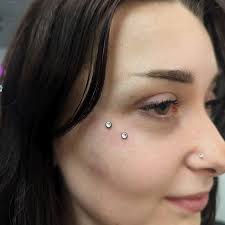 Talk about bling 😍✨ Fresh anti-eyebrow for this cutie! Swipe for healed  dermals 🎉 (1 year) I've got time this weekend babes, come see meeee 😘  @trueaddictiontattoo