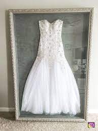 Pin By Weddings On After The Wedding Wedding Dress Storage Wedding Dress Frame Wedding Dress Preservation