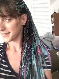 Need your hair braided? Check her out! That's me in the photo.