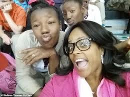 REVEALED: Ta'Kiya Young, 21, was SEVEN MONTHS pregnant when she was 'shot  in the face' by cop