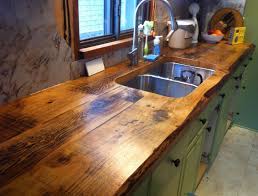 Grothouse wood counters can be constructed any size in one piece and eliminates the worry of an unsightly seam common with island countertops constructed of granite or stone slabs. Charming And Classy Wooden Kitchen Countertops Wooden Countertops Kitchen Farmhouse Sink Kitchen Rustic Kitchen