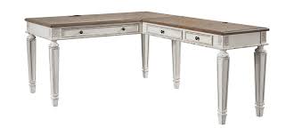 It is a dar wood low height table with clean and. The Realyn White Brown Home Office L Shaped Desk Available At Riley S Rooms Serving Tecumseh And Windsor On
