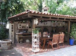 An extensive patio and roof using reclaimed wood and a. Photoplog Finished Ovens Outdoor Kitchen Outdoor Kitchen Decor Rustic Outdoor Kitchens