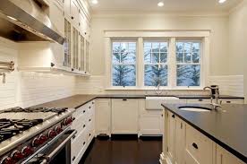 Black Soapstone Counters White Cabinets White Subway Tile White Kitchen Interior Design Glass Fronted Kitchen Cabinets Home