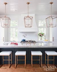 Windows On Either Side Of Stove Pendants Subway Tile Dark Island Home Decor Kitchen Home Kitchens Kitchen Renovation