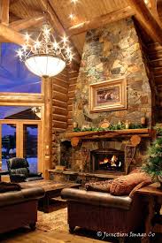 What Better Place To Spend A Snowy Winter Evening That In Front Of A Big Fireplace In A Log Home Log Home Living Living Room Design Decor Log Homes