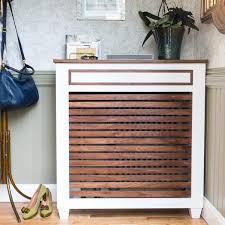 Uncovered radiators are ugly and a potential source of contact burns. Hide Ugly Radiators With These 12 Clever Cover Ideas Family Handyman