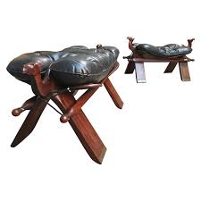 Vintage mid century moroccan tuareg camel wooden saddle stool with leather cushion. Camel Saddles 35 For Sale On 1stdibs