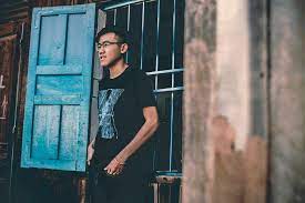 | meaning, pronunciation, translations and examples. Man Wearing Black Crew Neck Shirt Near Blue Wooden Window Photo Free Human Image On Unsplash