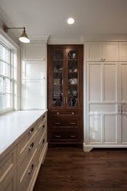 White Kitchen With China Cabinet Stained In Walnut White Kitchen With Dark Walnut China Cabinet Kitchen Remodel Farmhouse Kitchen Cabinets Kitchen Cabinets