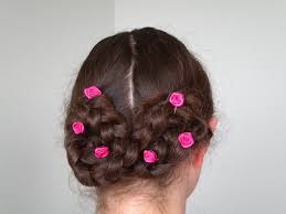 This hairdo is a bit more on the playful side than most, but it's also super functional because it's really secure. Medieval Double Braided Bun Locksofelegance